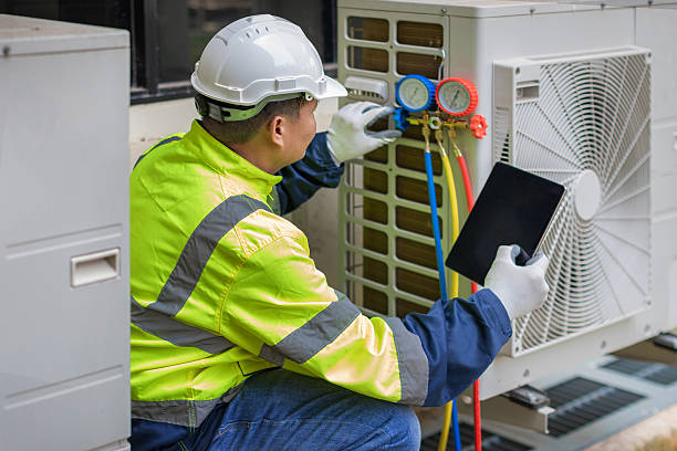 Professional Heat Pump Repair technician working in Taylor, TX